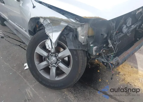 2015 Nissan Titan Sv z USA, uszkodzony, nr VIN 1N6BA0ED9FN511409